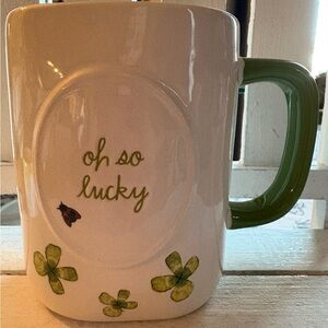 Rae Dunn White Mug with Green Handle and Lucky Clover Design